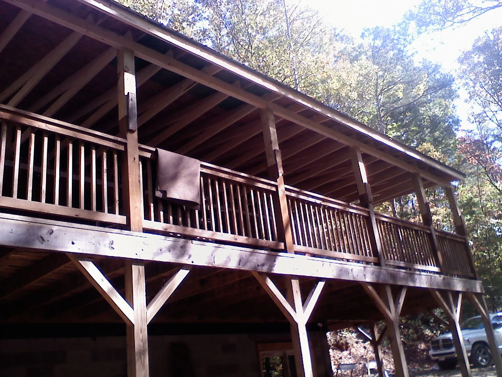 Timber framing under a new elevated porch and deck — Roof Leak Repair in Warner by Roofing Brothers